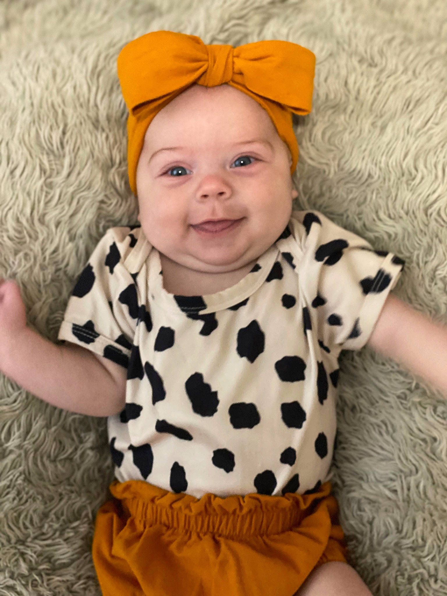 Brynley is registered to the contest to win money with this photo: baby, baby_toddler_clothing, cap, cheek, clothing, face, facial_expression, hairstyle, head, headwear, joy, organ, outerwear, person, photograph, product, skin, sleeve, smile, standing