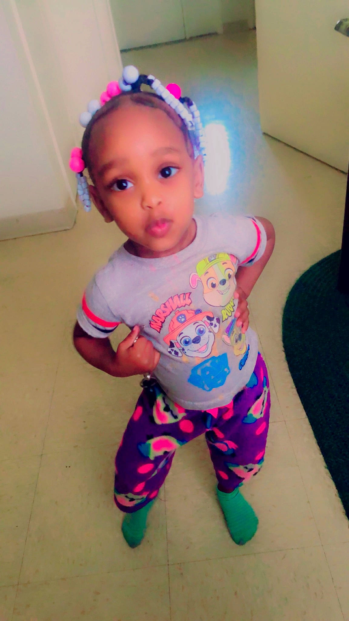 Janiya is registered to the contest to win money with this photo: baby, baby_toddler_clothing, cheek, child, foot, fun, happy, head, human_leg, magenta, party_supply, pattern, person, pink, purple, sleeve, t_shirt, textile, thigh, toddler