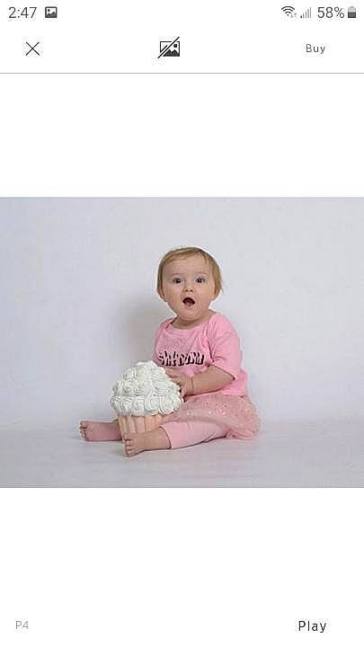 Harmoney is registered to the contest to win money with this photo: baby, baby_products, baby_toddler_clothing, beige, child, costume, fur, person, pink, product, sitting, sleeve, surprise, toddler