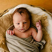Mathis participe au concours pour gagner de l'argent avec cette photo : newborn, baby, basket, blanket, burlap, swaddled, infant, portrait, skin, head, hand, soft, cozy, sleepy, resting, indoors, closeup, cute, child, peaceful