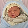 Mathis a rejoint le concours — aidez-le/la à gagner de superbes lots ! newborn, baby, sleeping, blanket, blue_blanket, hat, cozy, cute, face, infant, child, wrapped, soft, warm, striped_clothing, peaceful, indoors, portrait, headwear, adorable