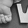 baby_fingers, baby_hand, background, black_and_white, child, close_up, cute, fingers, infant, letters, love, love_message, monochrome, small_hand, soft, still_life, tender, texture, wood, wooden_letters