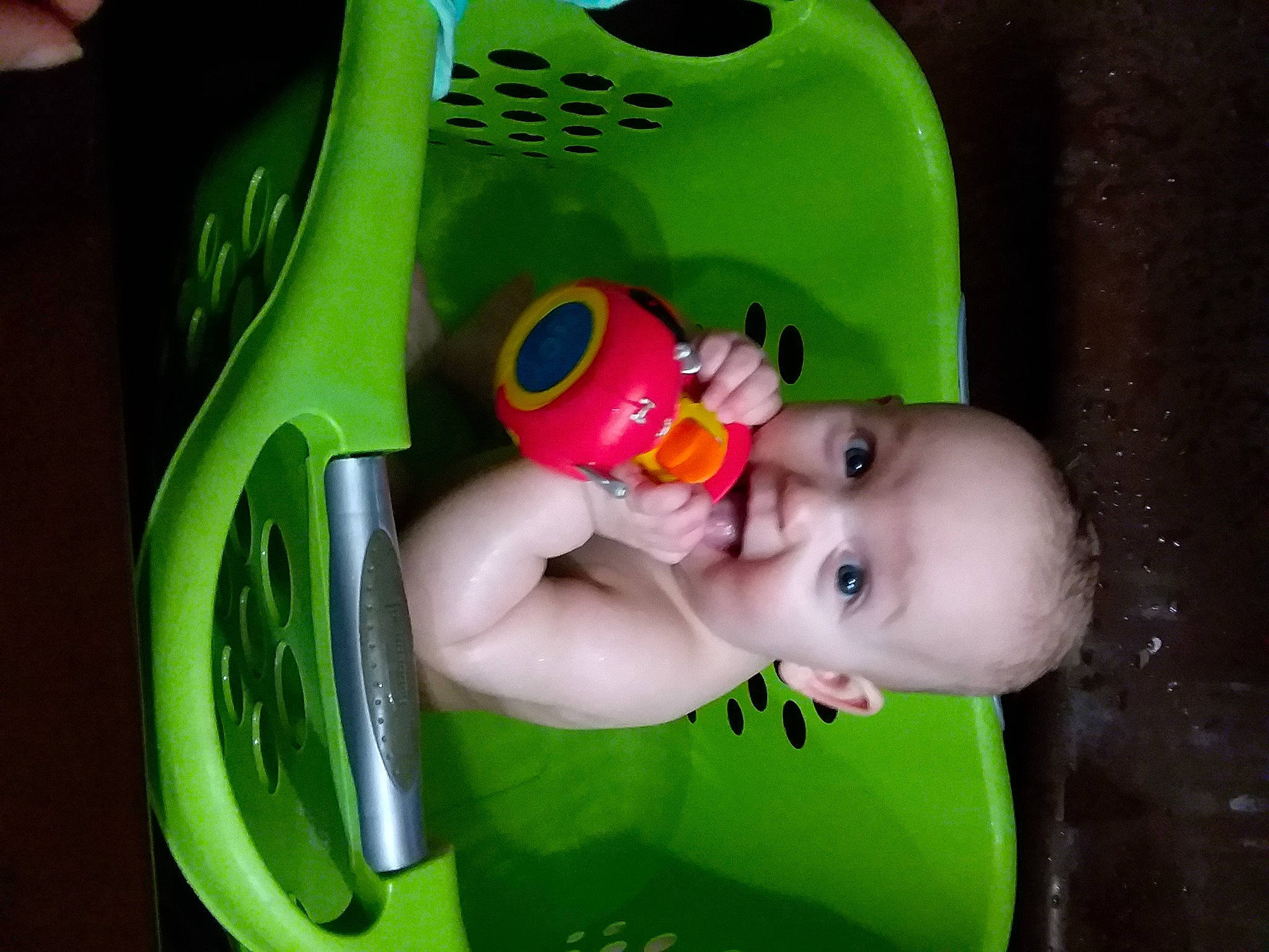 Autumn is registered to the contest to win money with this photo: baby, baby_products, baby_safety, baby_toddler_clothing, baby_toys, bathing, cheek, child, fun, green, happy, motor_vehicle, mouth, nose, person, plastic, play, product, toddler, toy