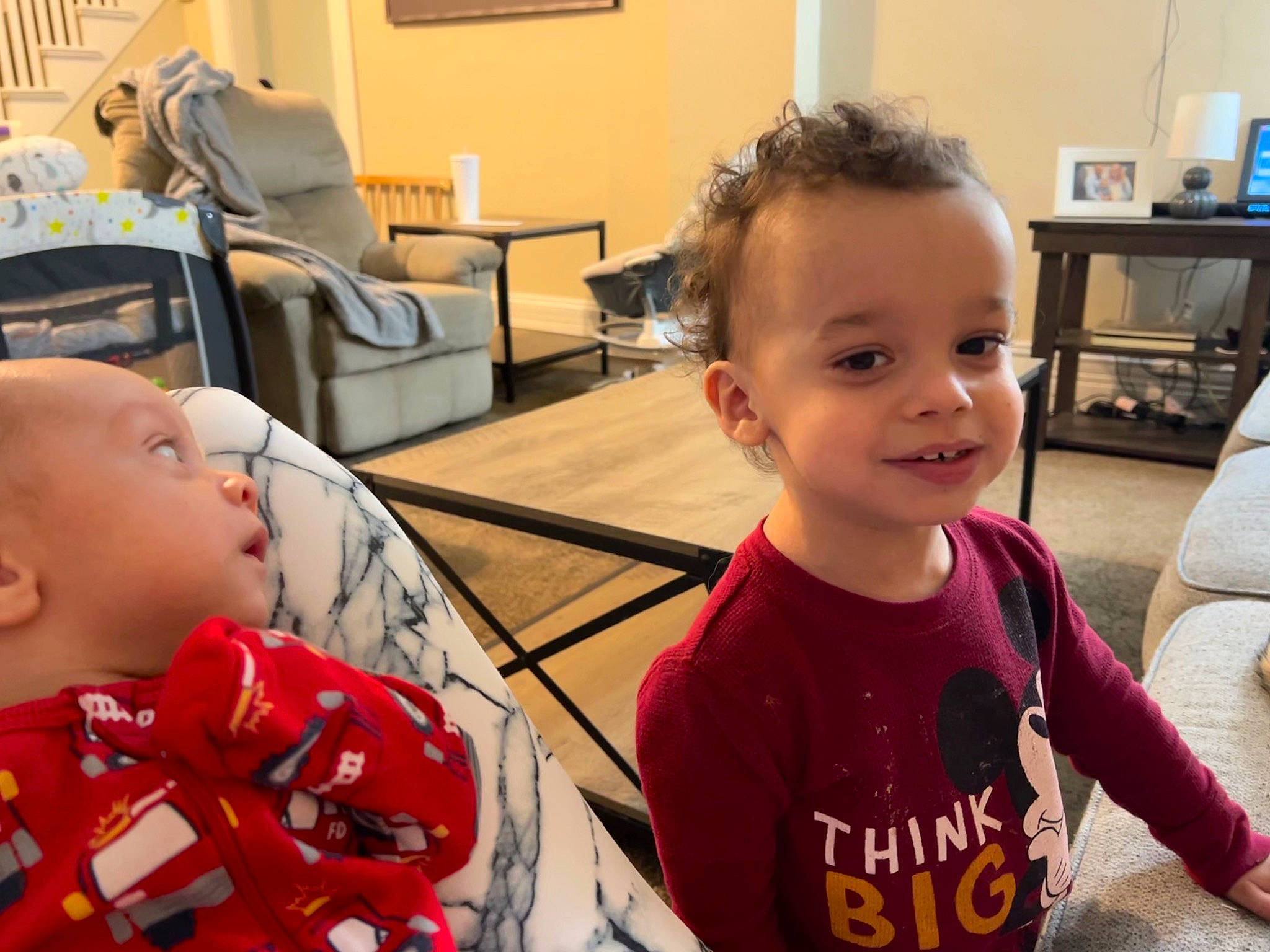 Jalen is registered to the contest to win money with this photo: baby, chair, child, chin, event, eye, flooring, fun, furniture, hairstyle, happy, iris, joy, leisure, person, room, sitting, skin, smile, t_shirt