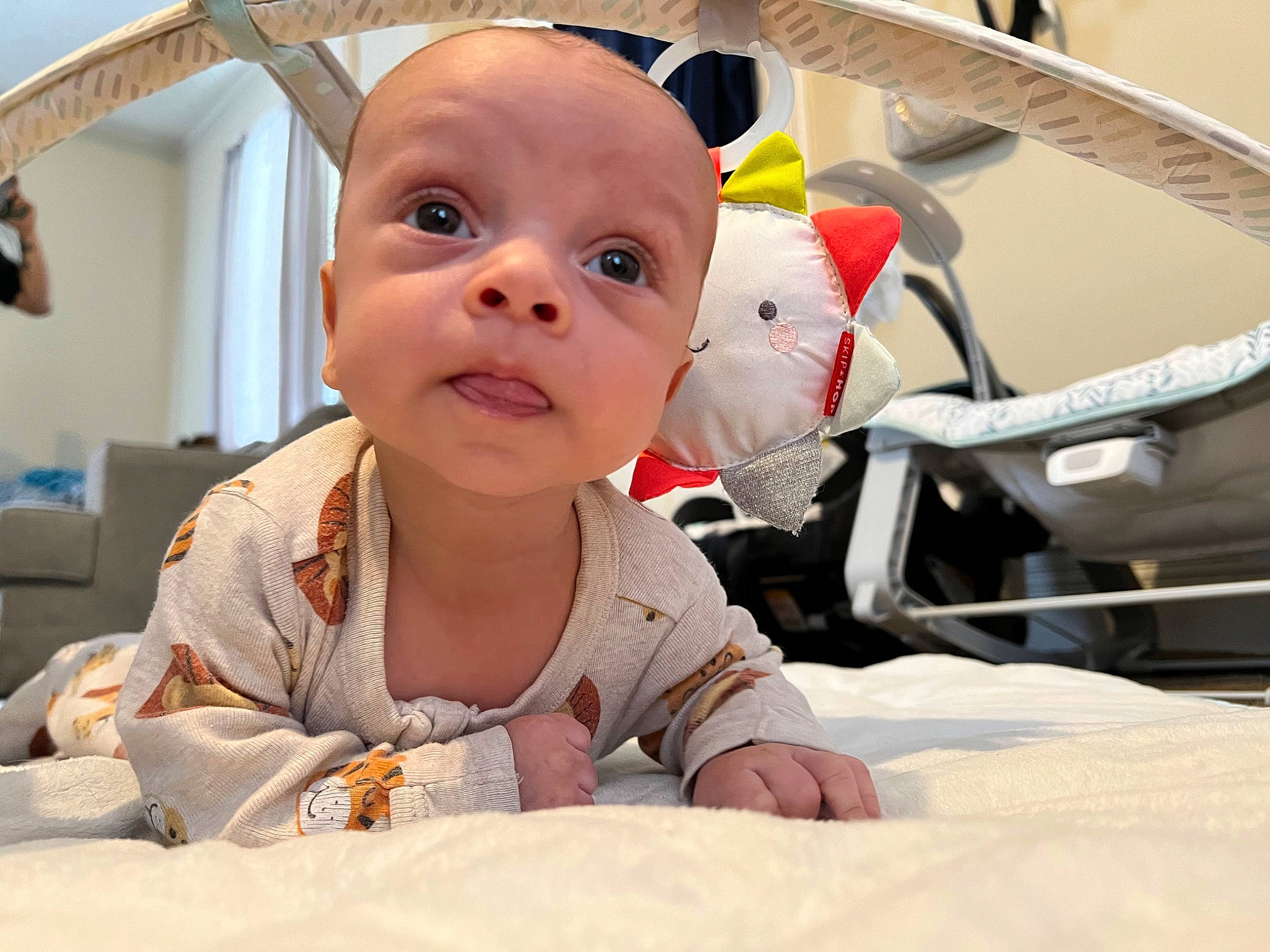 Elijah is registered to the contest to win money with this photo: auto_part, baby, baby_products, baby_toddler_clothing, cheek, child, comfort, eyebrow, fun, happy, linens, nose, person, sitting, skin, steering_wheel, toddler, vehicle_door