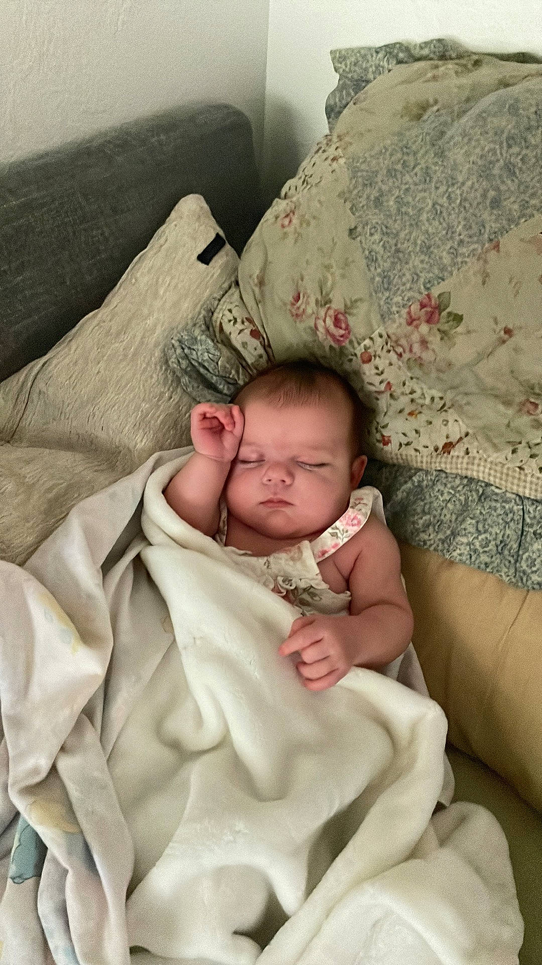 Catherine is registered to the contest to win money with this photo: baby, baby_products, baby_sleeping, baby_toddler_clothing, bedding, bedtime, cheek, child, comfort, couch, face, hand, head, linens, mammal, person, product, room, skin, textile