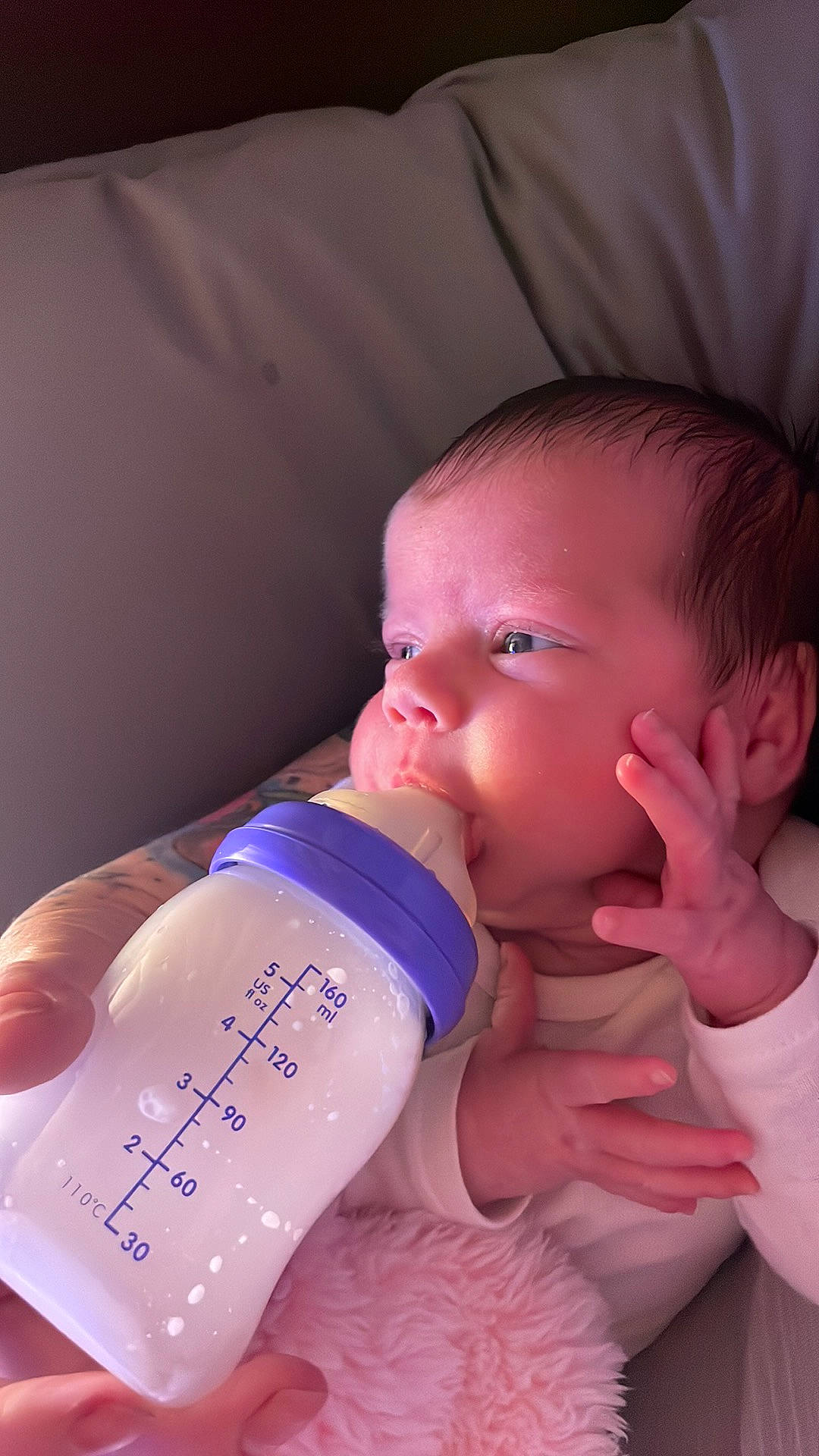 Catherine joined the competition — help win amazing prizes! baby, baby_bottle, bottle, cheek, drinkware, eyelash, facial_expression, finger, fluid, gesture, hand, lip, liquid, mouth, nail, neck, nose, person, plastic_bottle, skin