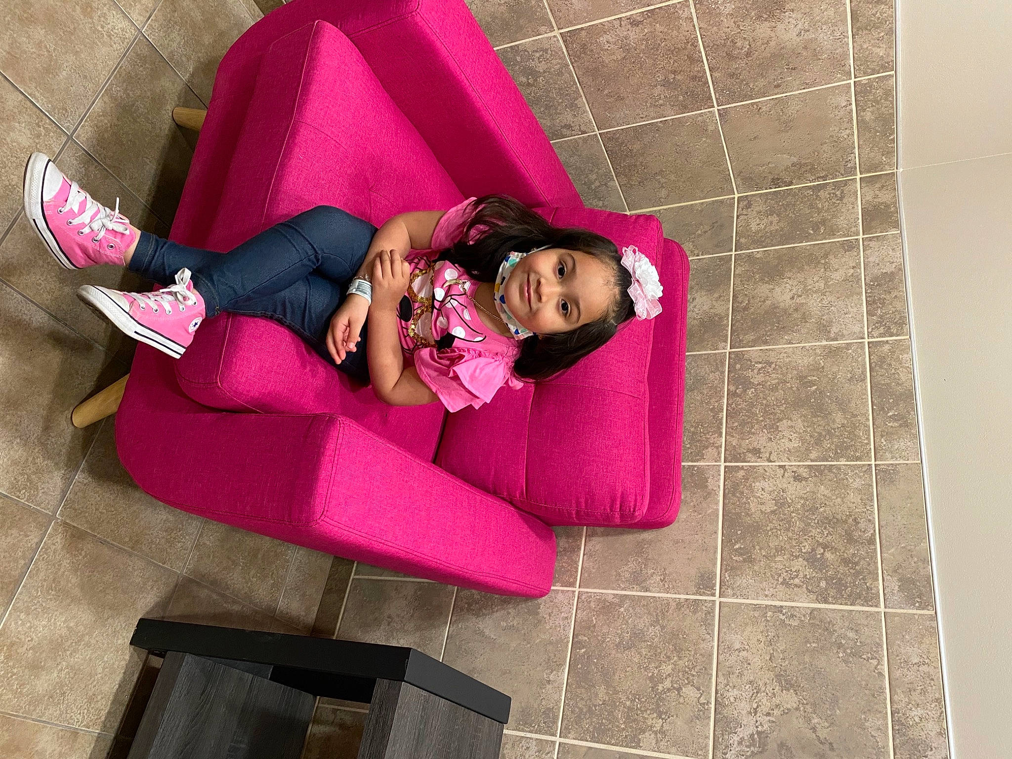 Jayleen is registered to the contest to win money with this photo: black_hair, carmine, comfort, eyewear, fashion_accessory, fashion_design, flooring, fun, human_leg, joy, knee, leisure, linens, long_hair, magenta, person, pink, purple, room, sitting