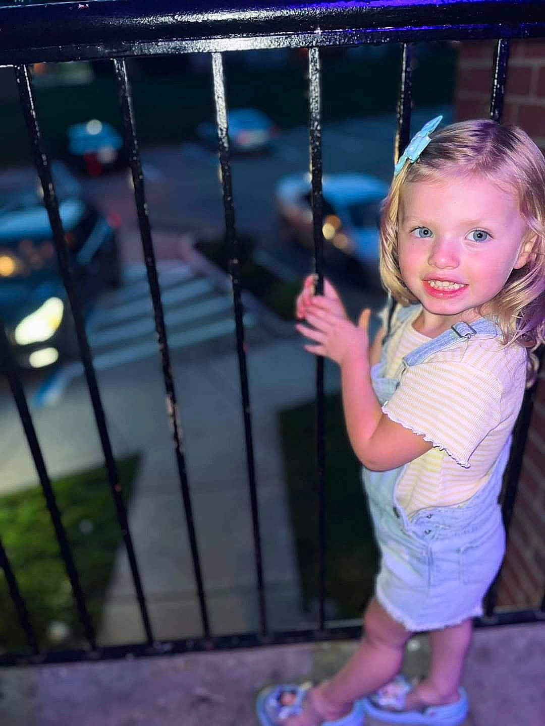 Braelynn joined the competition — help win amazing prizes! baby_toddler_clothing, child, city, clothing, electric_blue, fence, flip_flops, foot, fun, hair, happy, head, joy, leisure, magenta, person, pink, play, sandal, smile