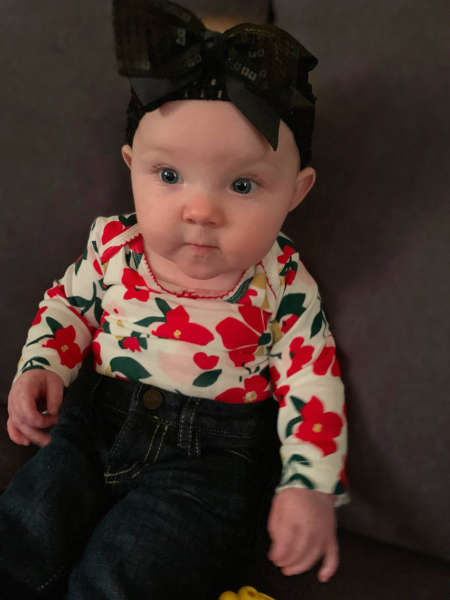 Kaydance is registered to the contest to win money with this photo: baby, baby_toddler_clothing, cheek, child, ear, eye, forehead, hair_accessory, head, headband, headgear, headwear, iris, lip, person, pink, sitting, skin, sleeve, smile
