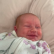 Katya is registered to the contest to win money with this photo: architecture, baby, bed, bedroom, blanket, building, clothing, cushion, face, furniture, glove, head, homedecor, hospital, newborn, person, photography, portrait, quilt, sleeping