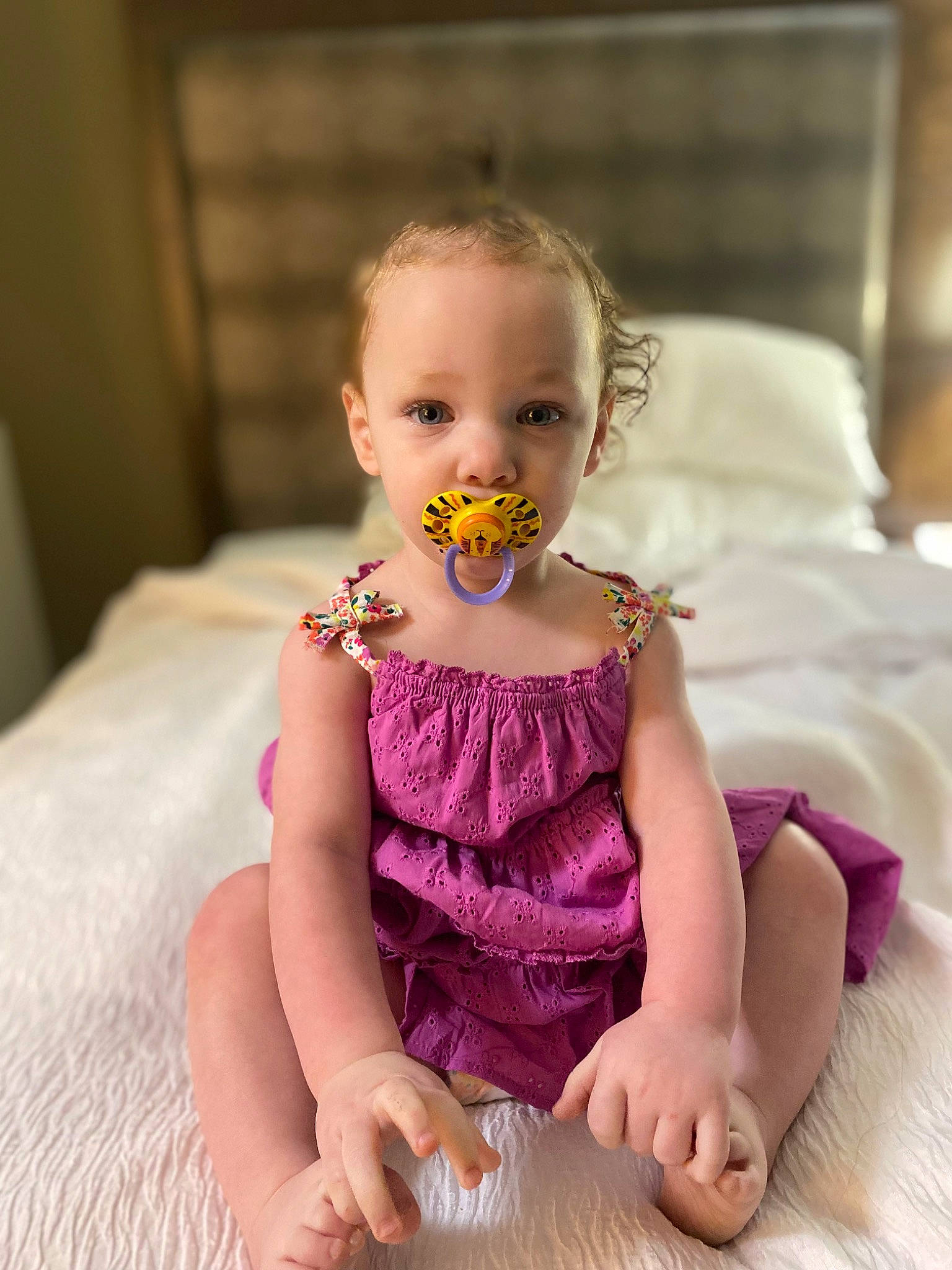 Kailynn is registered to the contest to win money with this photo: baby, baby_toddler_clothing, cheek, child, finger, fun, hair, happy, human_leg, iris, lip, magenta, mouth, person, pink, purple, sitting, skin, sleeve, tableware