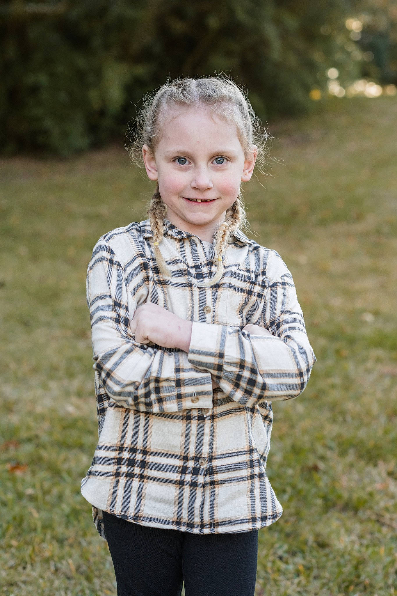 Trinity is registered to the contest to win money with this photo: child, dress_shirt, flash_photography, fun, grass, grassland, hair, happy, joy, pattern, people_in_nature, person, plaid, plant, portrait, portrait_photography, shirt, sleeve, smile, t_shirt