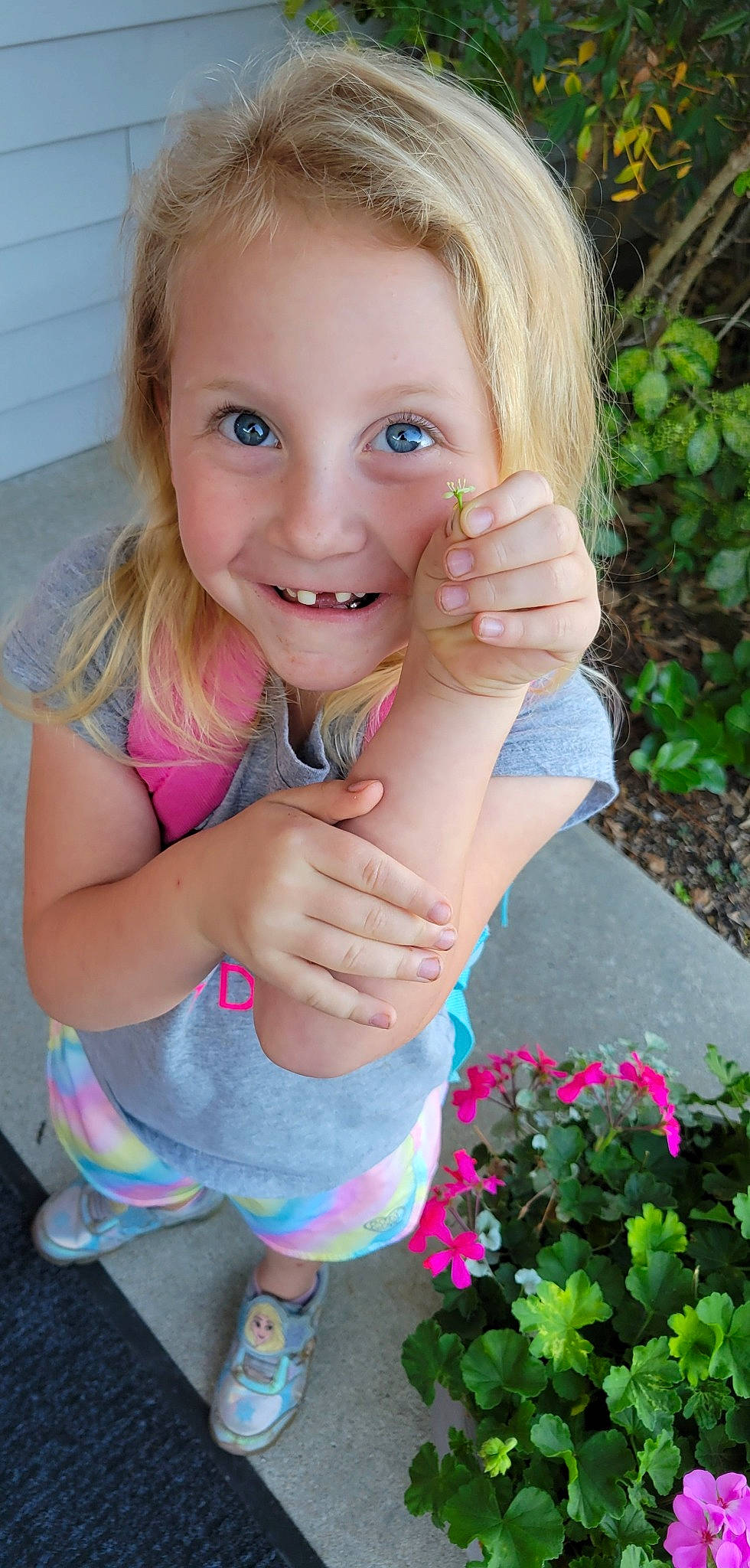 Trinity joined the competition — help win amazing prizes! baby_toddler_clothing, eye, face, finger, flower, fun, gesture, grass, happy, head, joy, lip, magenta, nail, people_in_nature, person, pink, plant, skin, smile