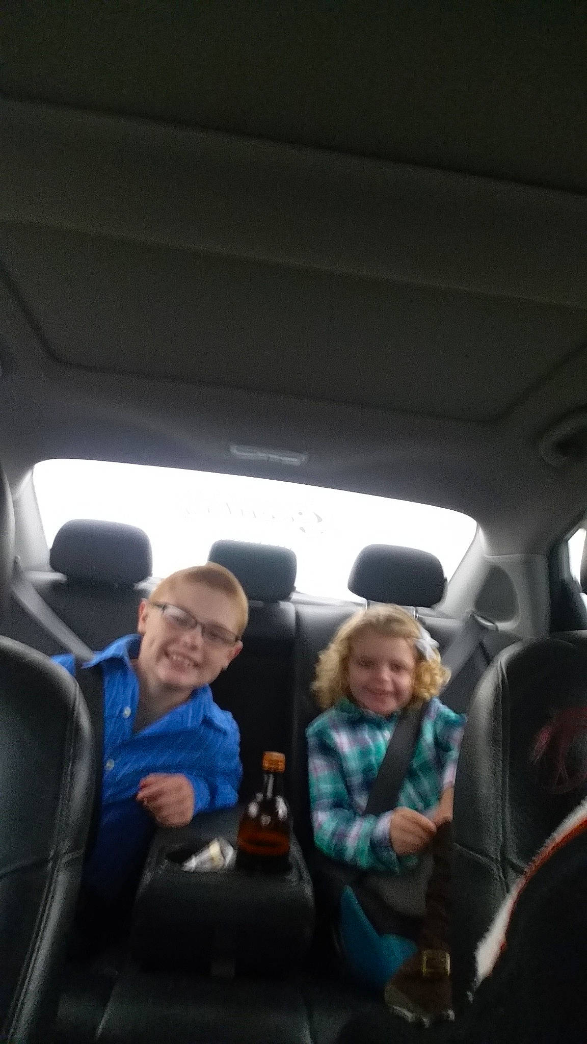 Ayvalynn is registered to the contest to win money with this photo: auto_part, automotive_exterior, car, car_seat, driving, family_car, head_restraint, joy, luxury_vehicle, mode_of_transport, passenger, person, vehicle