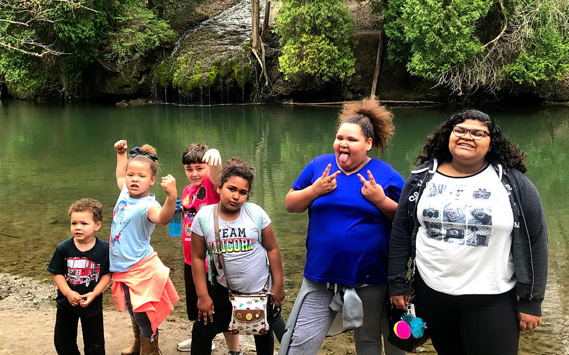 Ashlee is registered to the contest to win money with this photo: child, community, event, family, fun, joy, jungle, leisure, people, person, recreation, river, social_group, style, team, tourism, tree, vacation, water, watercourse