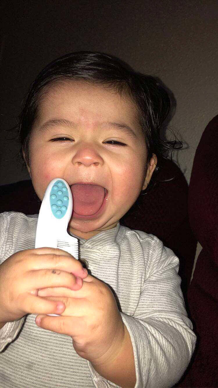 Jovan is registered to the contest to win money with this photo: baby, cheek, child, finger, mouth, nose, person, skin, smile, thumb, toddler, tooth