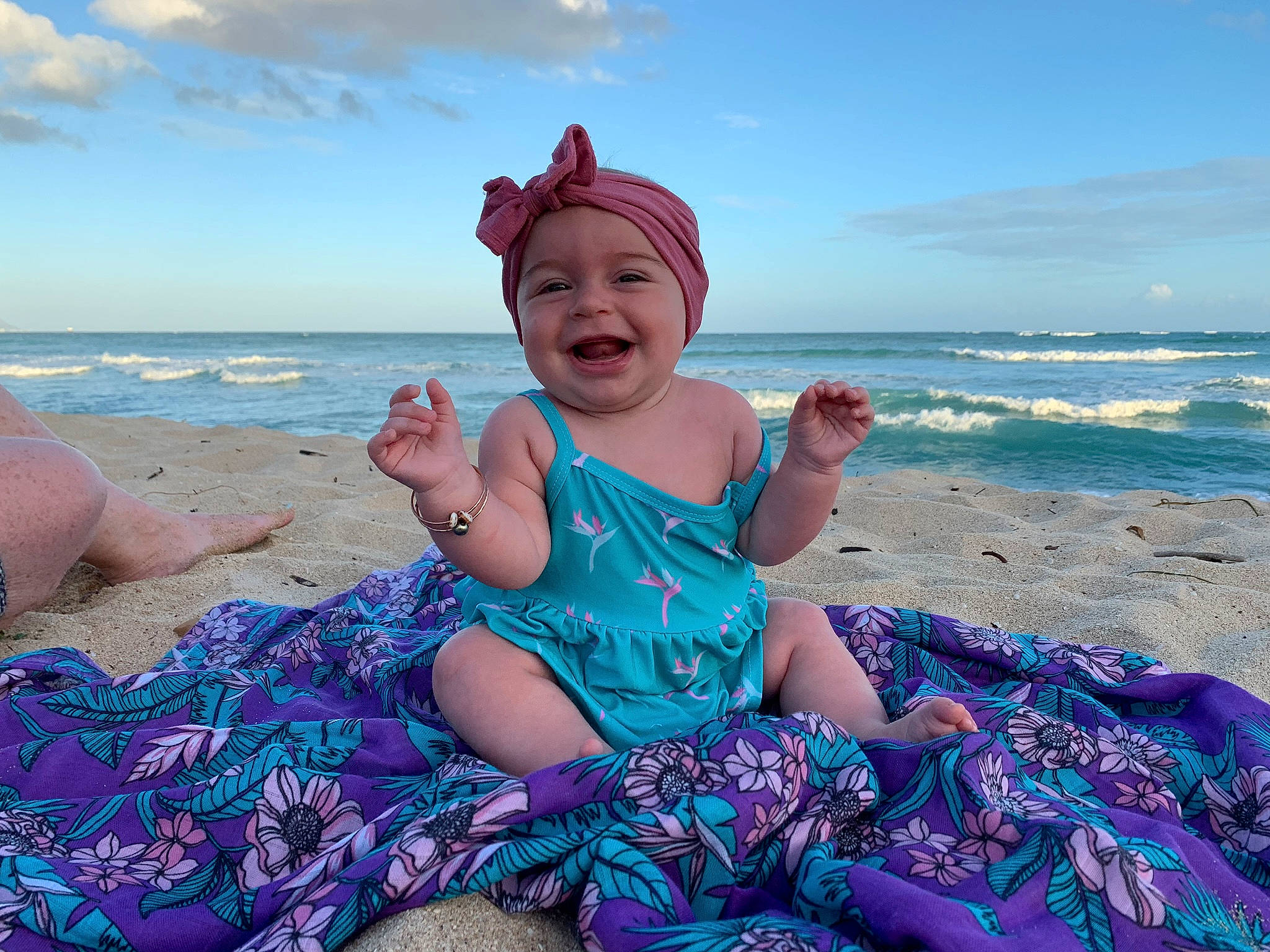Annika joined the competition — help win amazing prizes! baby, beach, blue, child, coast, fashion_accessory, fun, happy, joy, ocean, person, photography, sand, sea, sky, smile, summer, toddler, tourism, turquoise
