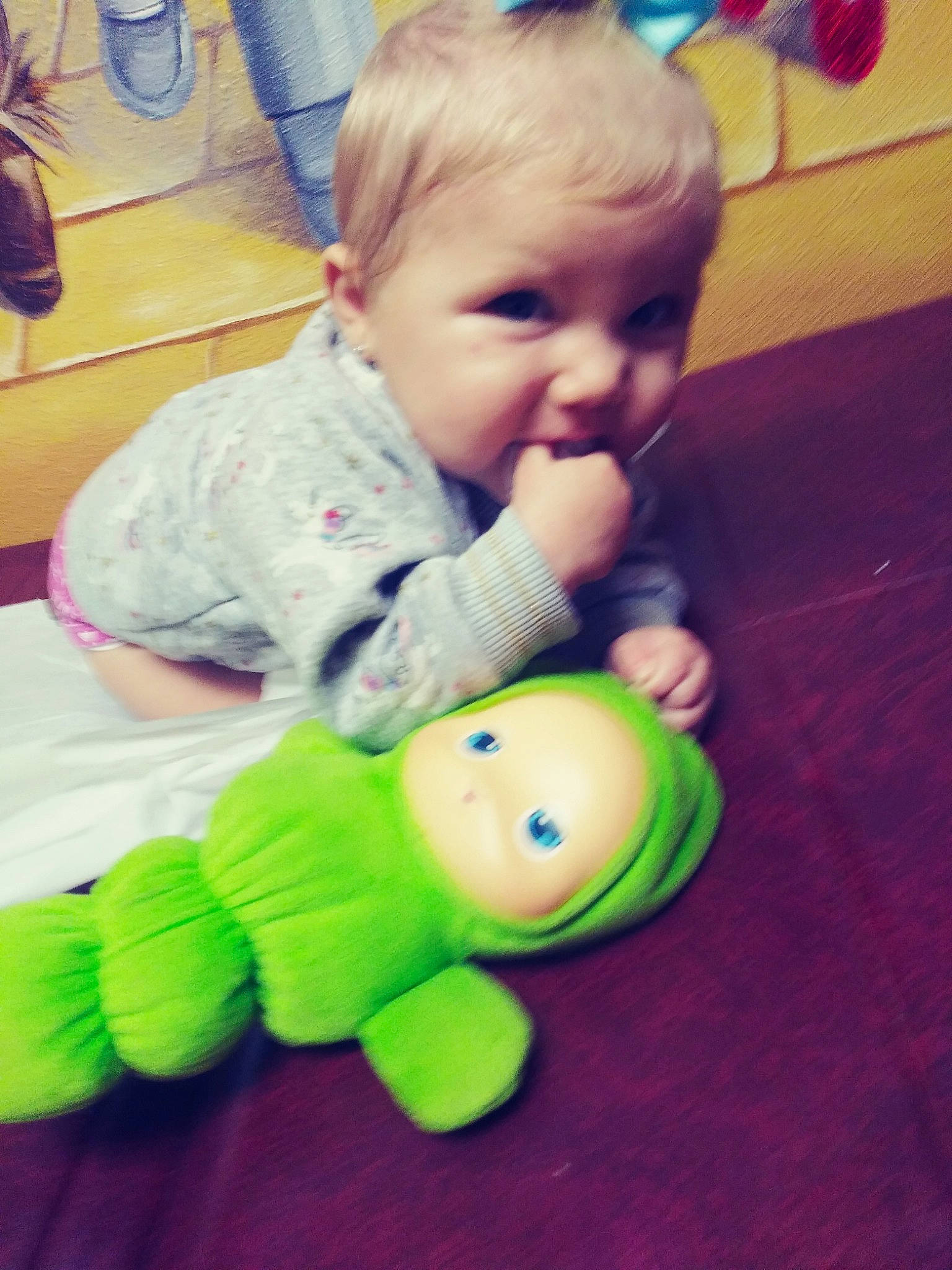 Marylou is registered to the contest to win money with this photo: baby, baby_toys, child, head, person, play, skin, smile, stuffed_toy, toddler, toy, tummy_time