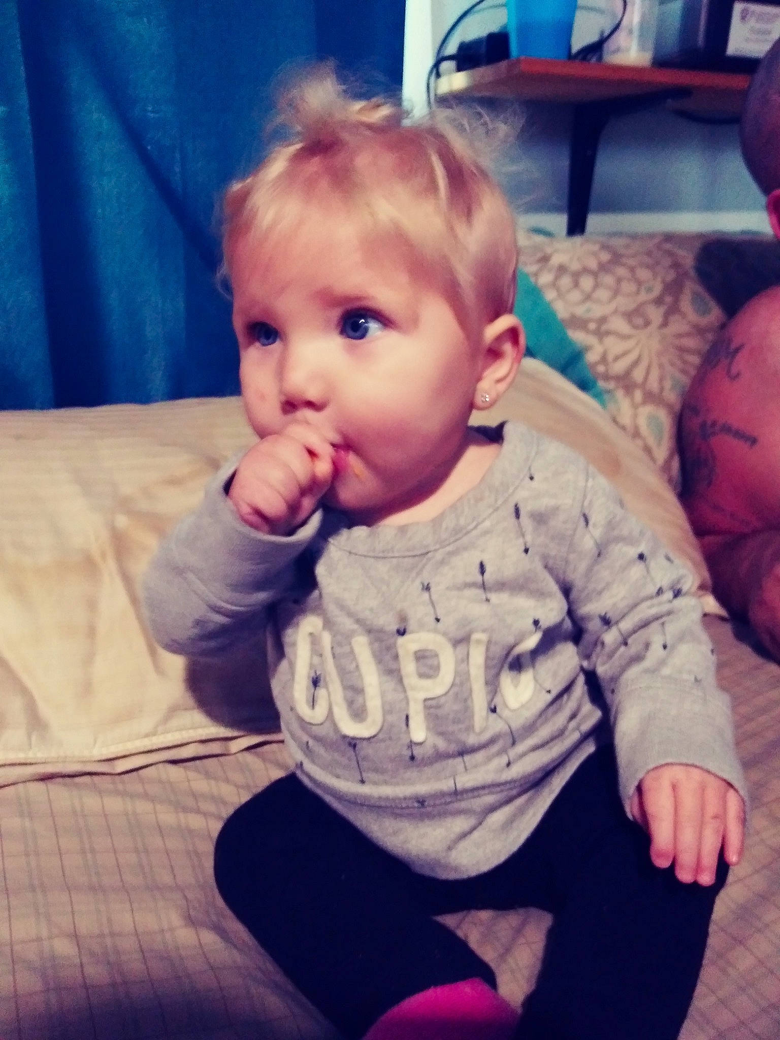 Marylou is registered to the contest to win money with this photo: arm, baby, blond, cheek, child, chin, ear, eye, face, facial_expression, head, lip, mouth, nose, person, play, sitting, skin, smile, toddler