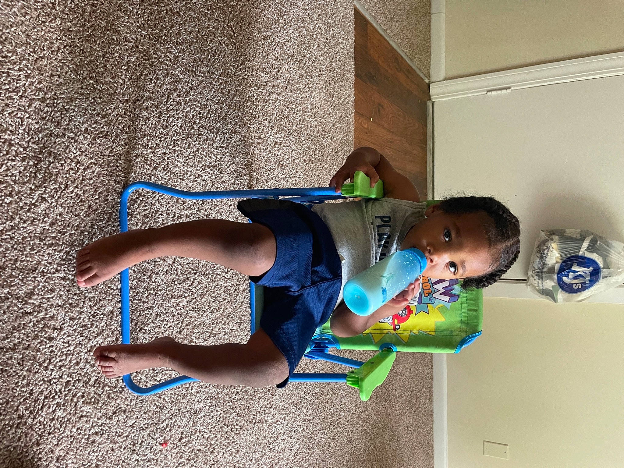 Tyrus is registered to the contest to win money with this photo: calf, elbow, electric_blue, foot, fun, human_leg, knee, leg, leisure, person, play, recreation, sandal, shorts, shoulder, sportswear, t_shirt, thigh, toddler, waist