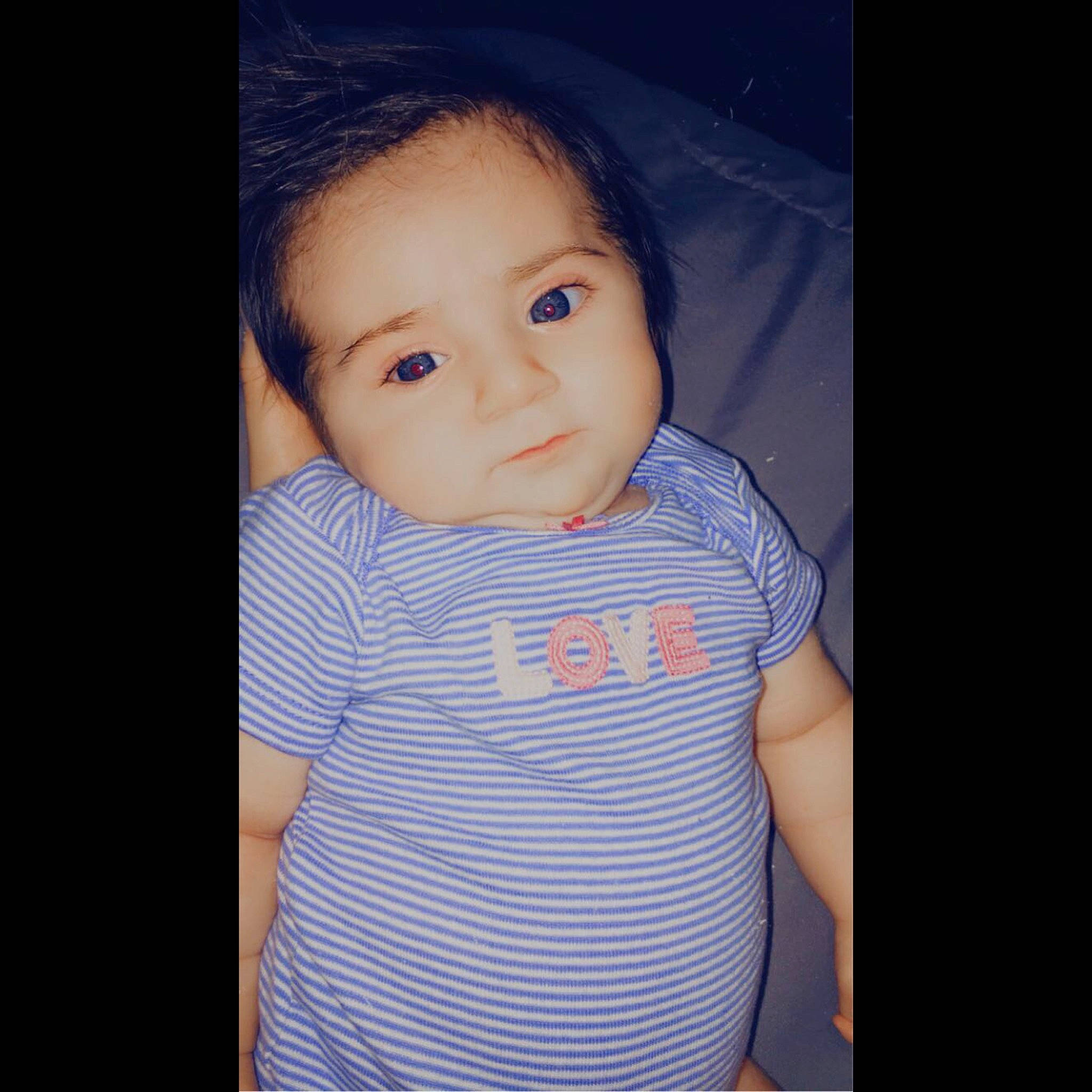 Iyannah Quinn is registered to the contest to win money with this photo: baby, beauty, cheek, child, chin, cool, eye, eyebrow, face, facial_expression, forehead, hair, head, iris, lip, nose, person, skin, smile, standing