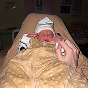 Krystale participe au concours pour gagner de l'argent avec cette photo : newborn, baby, blanket, sleeping, hand, hat, cozy, indoor, person, infant, cute, soft, warm, tenderness, wrapped, clothing, skin, peaceful, rest, portrait