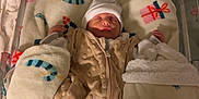 Krystale participe au concours pour gagner de l'argent avec cette photo : newborn, baby, sleeping, bassinet, hospital, blanket, hat, sleep_sack, infant, cozy, holiday, candy_cane, gift, bed, soft, wrapped, child, cute, peaceful, indoors