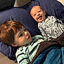 Avery joined the competition — help win amazing prizes! child, children, bed, pillow, blanket, smile, happy, tongue_out, pajamas, striped_clothing, animal_print, hair, face, indoor, cozy, sleepwear, two_people, lying_down, cute, sibling