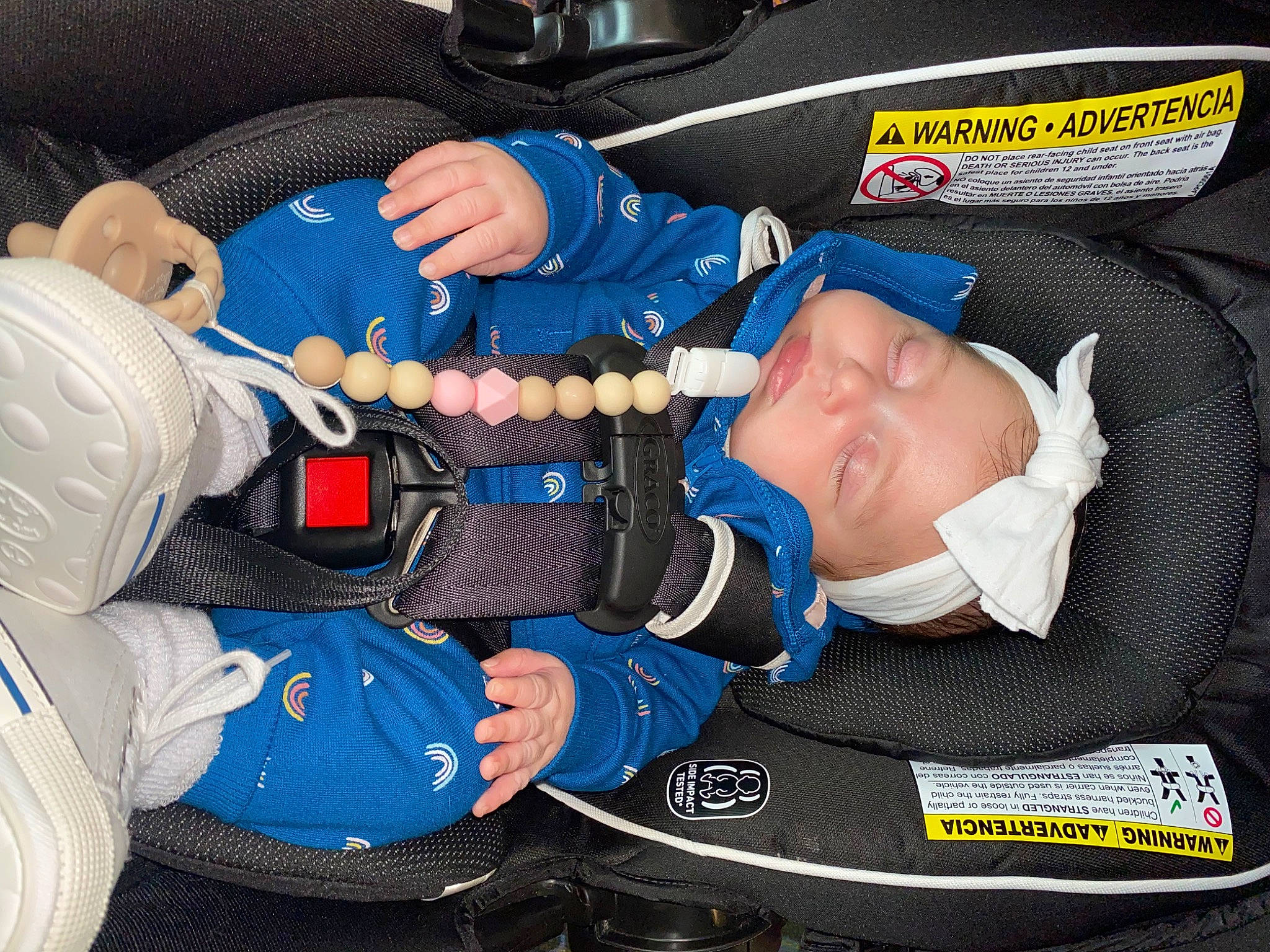 Avianna is registered to the contest to win money with this photo: auto_part, baby, baby_carriage, baby_products, baby_toddler_clothing, bag, blue, car_seat, child, comfort, elbow, electric_blue, gesture, headwear, lap, person, personal_protective_equipment, sitting, toddler, wrist