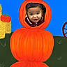 baby, child, pumpkin, pumpkin_costume, halloween, autumn, portrait, smiling, face, indoors, colorful, orange, blue_background, hand_painted, costume, infant, cute, seasonal, holiday, photography