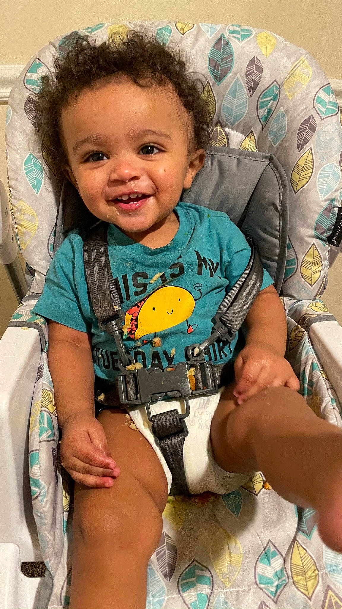 Blaize is registered to the contest to win money with this photo: arm, baby, baby_toddler_clothing, cheek, eye, face, facial_expression, finger, hairstyle, happy, head, iris, joy, mouth, neck, organ, person, skin, sleeve, smile