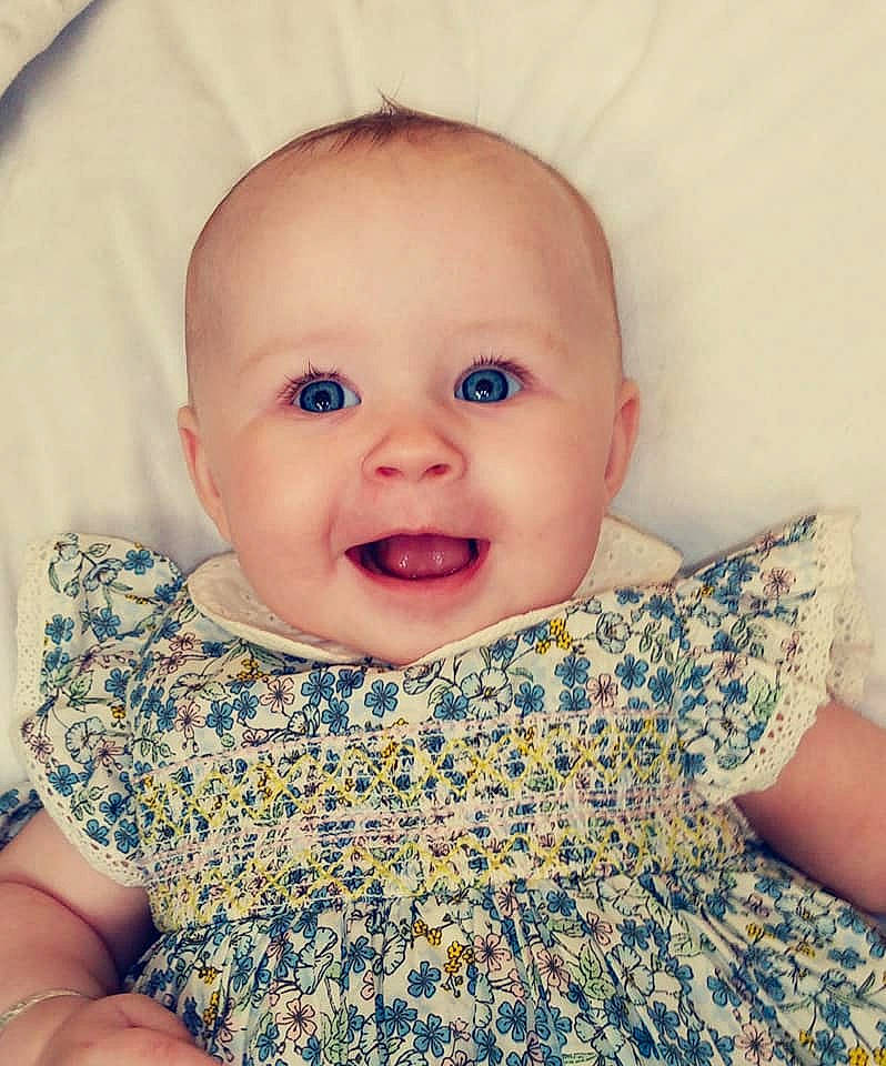 Amelia-rose is registered to the contest to win money with this photo: azure, baby, baby_toddler_clothing, cheek, chin, collar, eye, eyebrow, face, happy, iris, lip, mouth, neck, nose, outerwear, person, skin, sleeve, smile