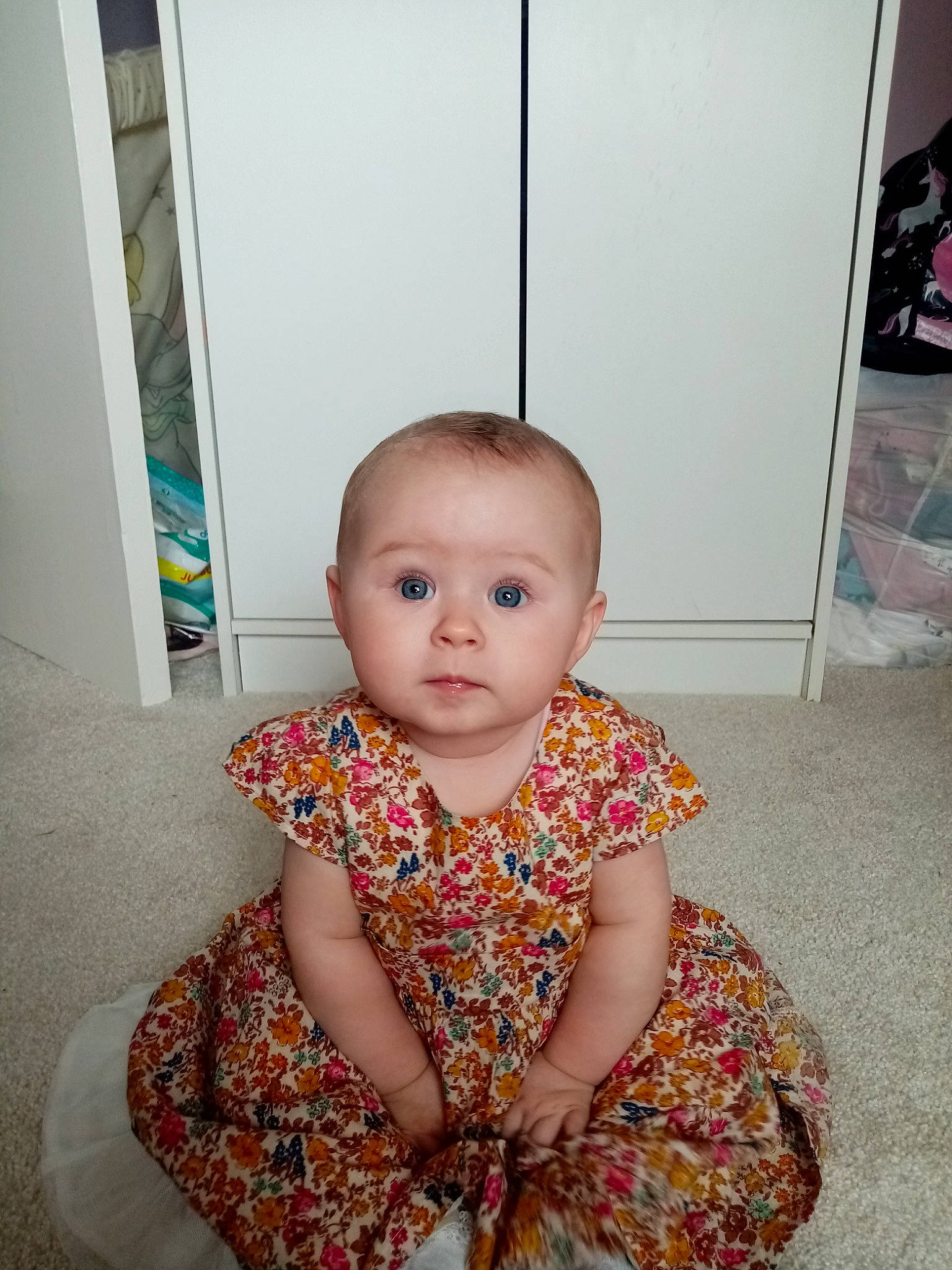 Amelia-rose joined the competition — help win amazing prizes! baby, baby_toddler_clothing, cheek, chin, facial_expression, finger, floor, flooring, fun, human_leg, iris, neck, pattern, person, pink, room, skin, sleeve, standing, toddler