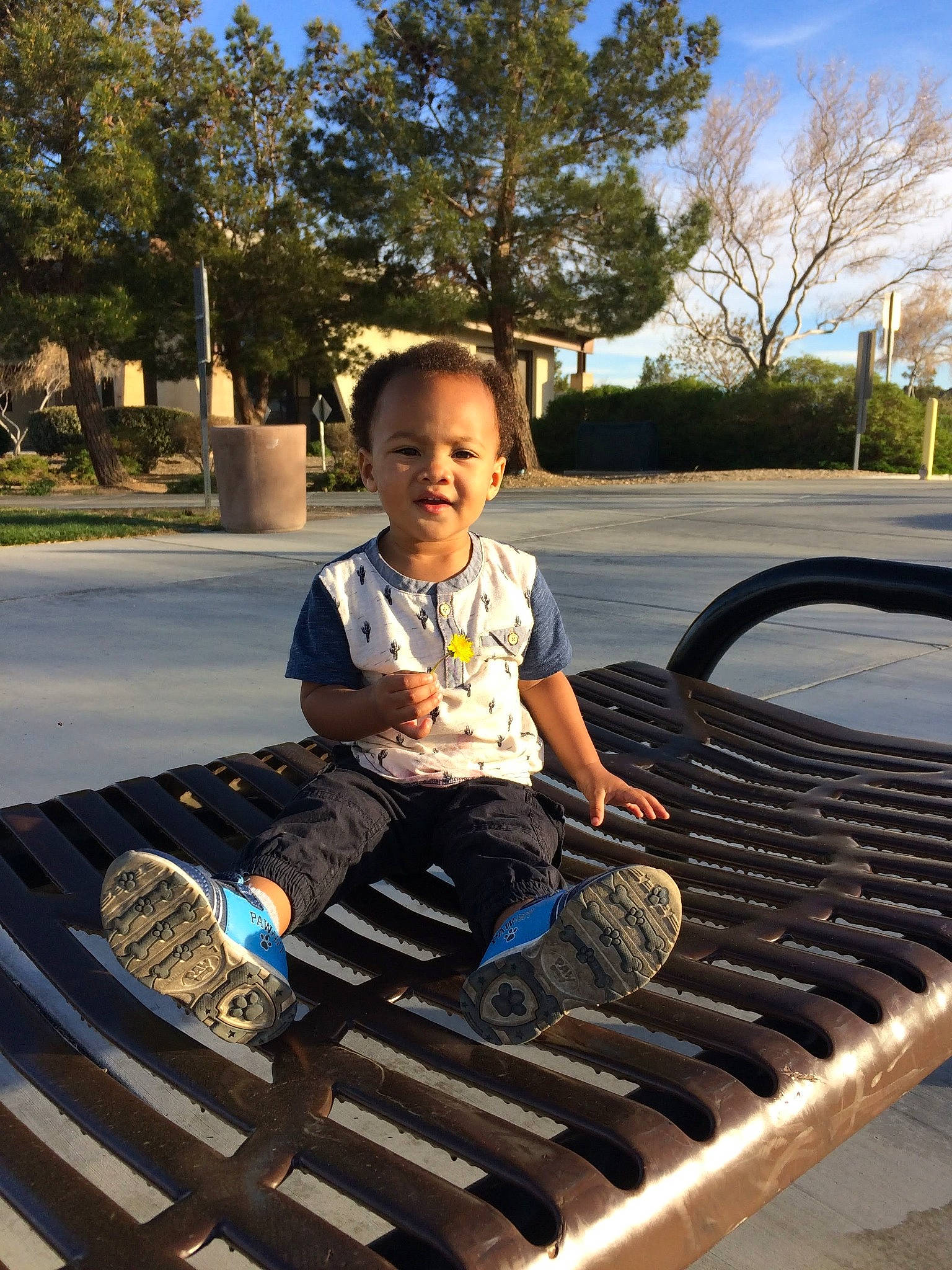 Yahudah is registered to the contest to win money with this photo: child, leisure, person, sitting, toddler, tree, vehicle