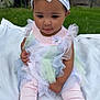 Lakyiah joined the competition — help win amazing prizes! toddler, child, baby, outdoor, grass, headband, bunny, ruffles, pastel_colors, pink, white_blanket, curly_hair, socks, cute, sitting, portrait, young_child, clothing, soft_toys, flower_accessory