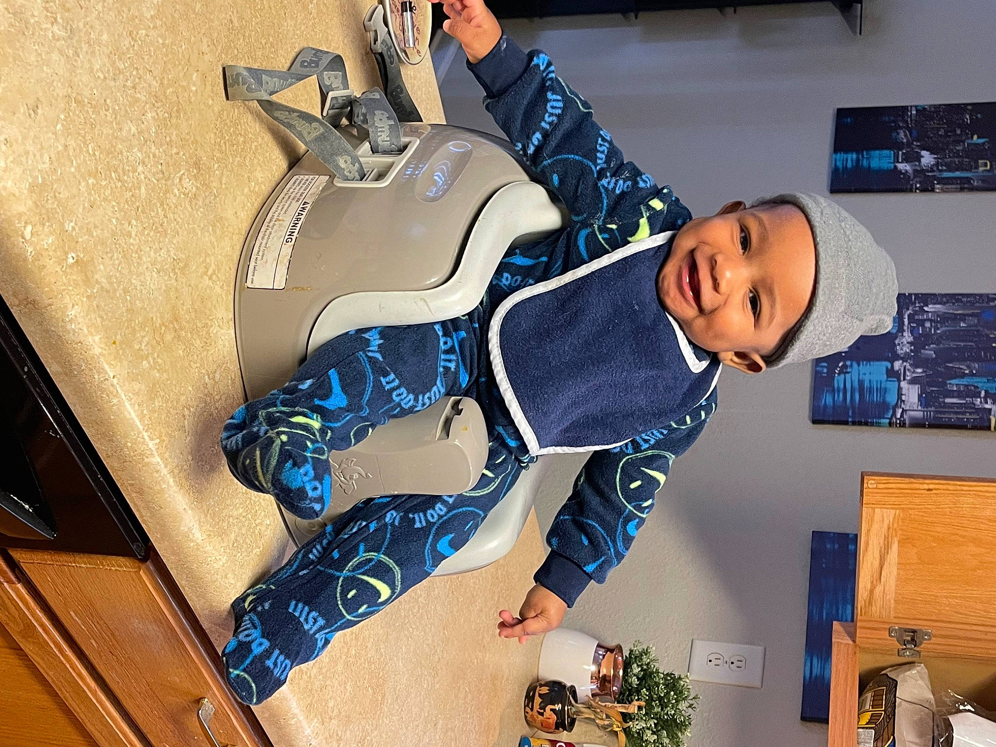 Ezekiel joined the competition — help win amazing prizes! child, electric_blue, fun, hat, headwear, joy, machine, person, personal_protective_equipment, plant, room, smile, suit, toddler