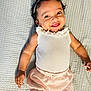 Queene is registered to the contest to win money with this photo: arm, baby, baby_toddler_clothing, chin, collar, eyelash, face, finger, flash_photography, happy, head, neck, outerwear, pink, shoulder, skin, sleeve, smile, toddler, waist