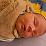 Ethan participe au concours pour gagner de l'argent avec cette photo : baby, sleeping, blanket, bed, soft, face, infant, peaceful, cozy, child, resting, pajamas, comfort, indoors, skin, head, young, portrait, cushion, closeup