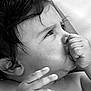 Vittorio participe au concours pour gagner de l'argent avec cette photo : baby, black_and_white, cheek, child, eye, face, finger, forehead, gesture, hand, head, lip, monochrome, mouth, neck, nose, photography, skin