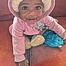 Kyzez Nicole Cox is registered to the contest to win money with this photo: baby, blue_toy, child, clothing, couch, crawling, cute, face, hand, hat, hoodie, indoors, infant, knit_hat, orange_couch, pacifier, person, plush, smiling, toy