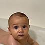 baby, child, bathtub, bath, water, skin, blue_eyes, face, wet, indoors, cute, infant, looking, expression, toddler, young, head, shoulder, human, bathroom