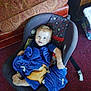 Robert joined the competition — help win amazing prizes! baby, child, car_seat, blanket, indoor, carpet, couch, foot, person, infant, seat, patterned, fabric, blue_blanket, toy, comfort, looking_up, cute, home, casual