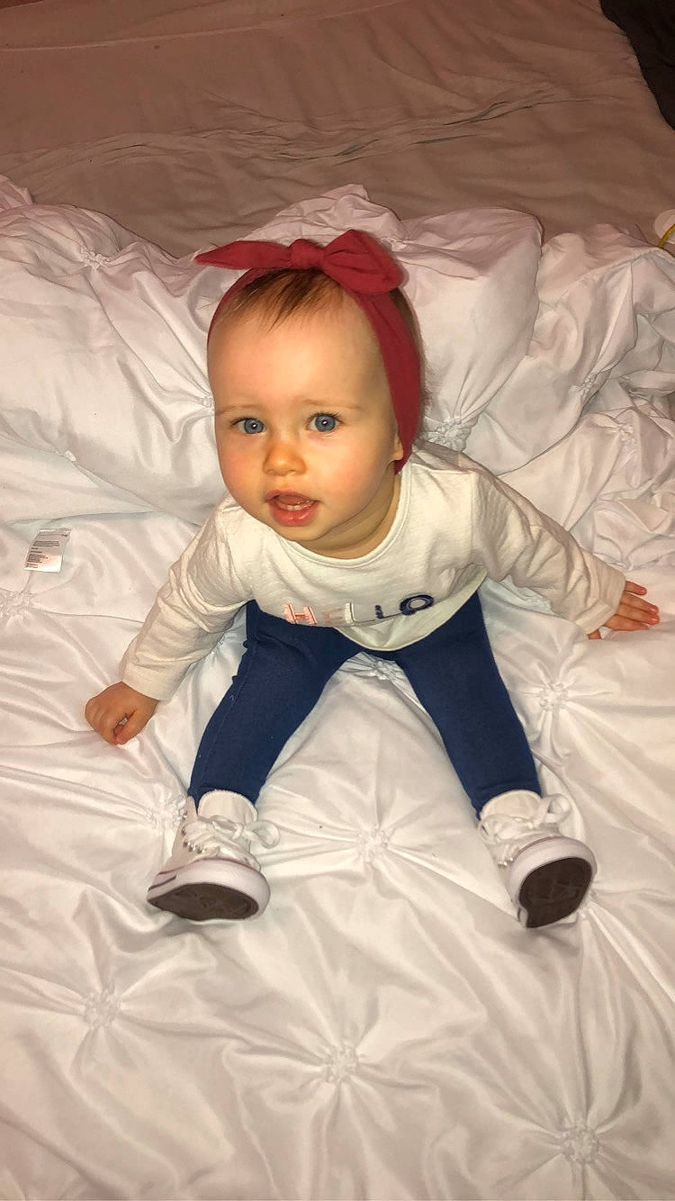 Lia participe au concours pour gagner de l'argent avec cette photo : baby, baby_toddler_clothing, beauty, cheek, child, comfort, costume, flooring, formal_wear, fun, happy, linens, person, portrait_photography, room, sitting, sleeve, smile, toddler