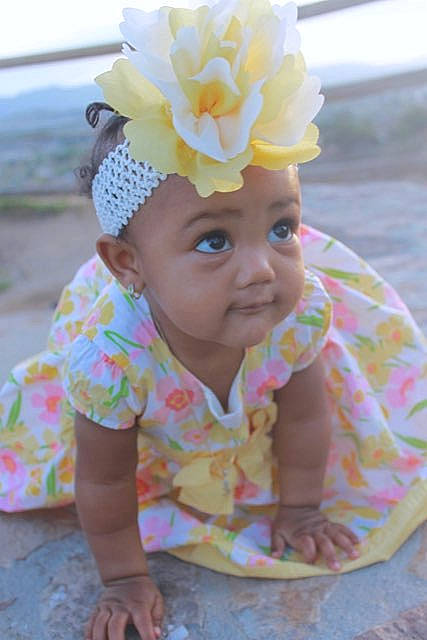 Jaziyah joined the competition — help win amazing prizes! baby, baby_toddler_clothing, cap, child, costume_hat, fun, happy, hat, headgear, headpiece, headwear, helmet, leisure, party_supply, pattern, person, pink, plant, sunglasses, textile
