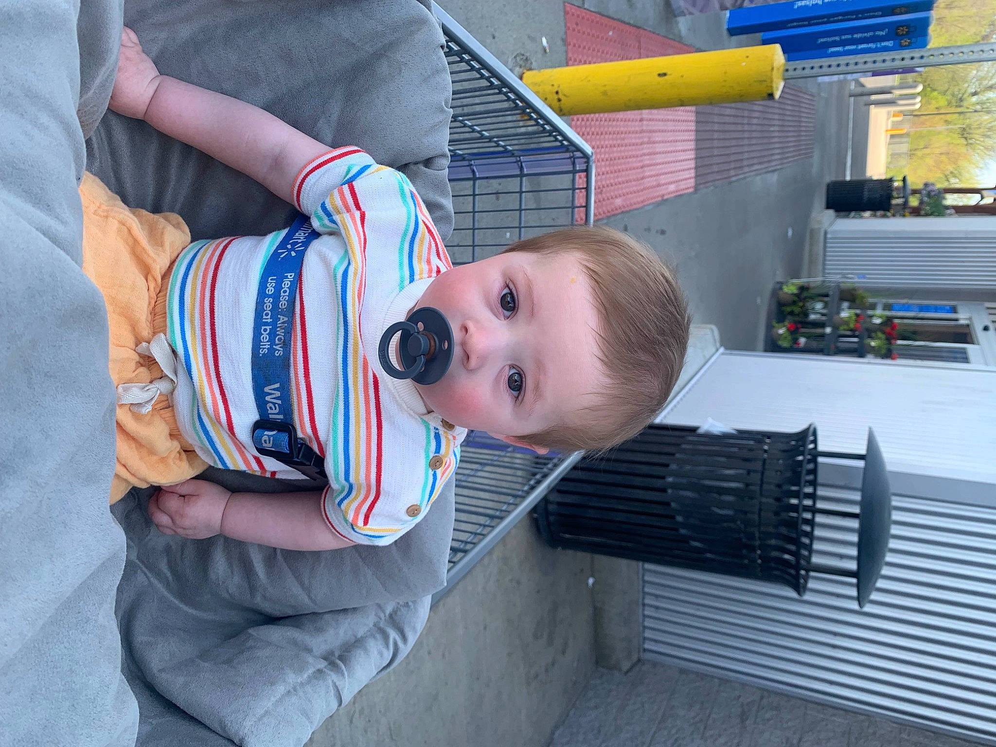 Lucius is registered to the contest to win money with this photo: baby, baby_products, baby_toddler_clothing, child, comfort, pattern, person, shelf, sitting, sleeve, toddler