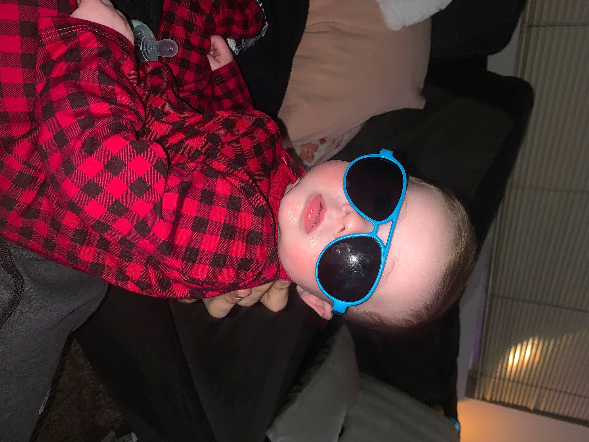 Lucius is registered to the contest to win money with this photo: audio_equipment, child, comfort, cool, electric_blue, event, eyewear, flash_photography, fun, gesture, goggles, magenta, nail, pattern, person, personal_protective_equipment, plaid, sunglasses, tartan, thigh