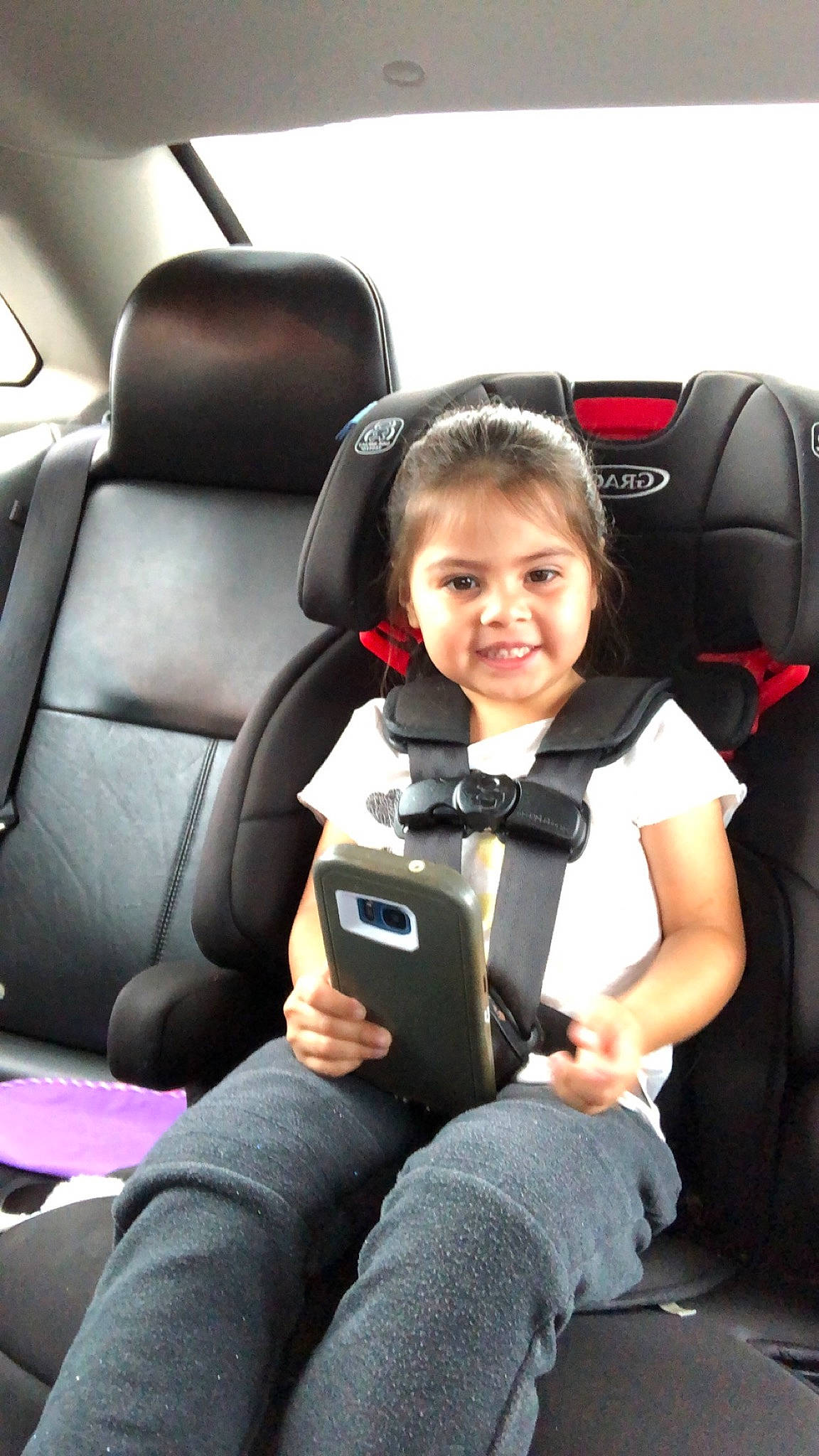 Armani is registered to the contest to win money with this photo: air_travel, auto_part, automotive_design, automotive_exterior, car, car_seat, car_seat_cover, comfort, family_car, hand, head_restraint, joy, motor_vehicle, person, personal_luxury_car, seat_belt, smile, steering_part, steering_wheel, travel