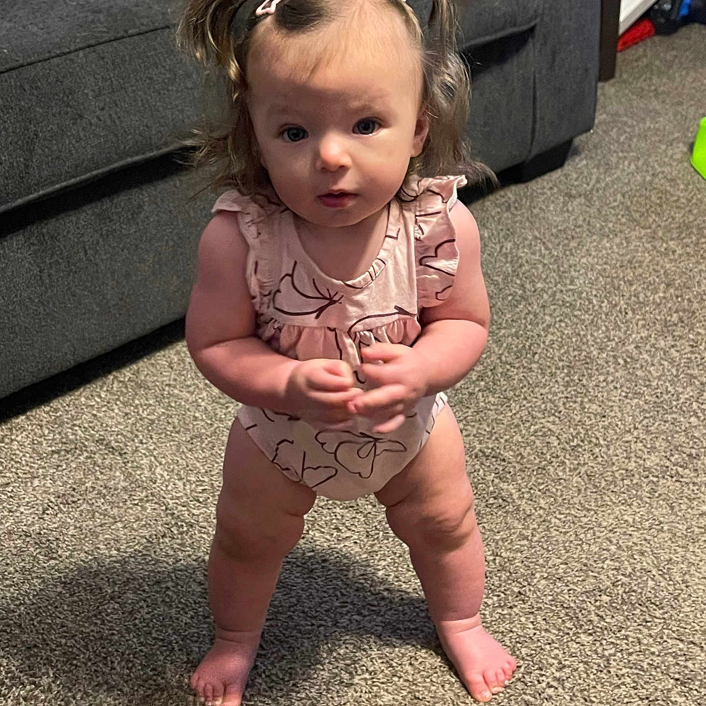 Winter is registered to the contest to win money with this photo: accessories, baby, babycrawling, barefoot, clothing, costume, couch, crawling, diaper, dress, face, head, headband, pants, person, photography, portrait, sitting, sleeve, standing