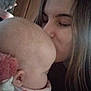 Leia joined the competition — help win amazing prizes! baby, woman, kiss, intimacy, close_up, affection, indoor, head, person, love, family, skin, hair, face, baby_clothes, scarf, caring, bond, gentle, portrait